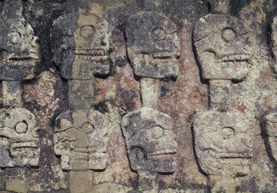 Relief depicting human skulls, detail of the Tzompantli, or Wall of Skulls, archaeological site of Chichen Itza by Unbekannt Unbekannt