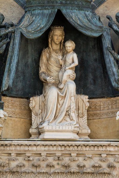 Madonna with Child on Bronze Canopy, lunette above central entrance, facade of Orvieto Cathedral, Umbria, Italy by Lorenzo Maitani
