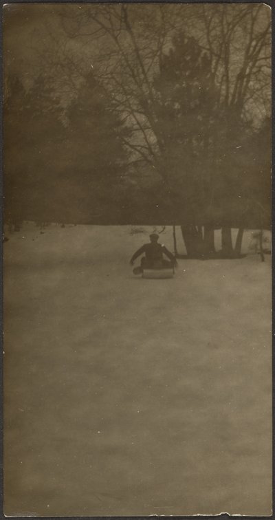 Figure on Sled in Snow by Louis Fleckenstein
