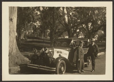 Figures at a Car with Flags by Louis Fleckenstein