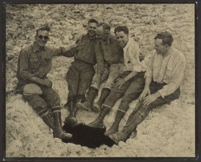 Group Portrait Seated at Mouth of Vertical Cave, San Jacinto Peak by Louis Fleckenstein