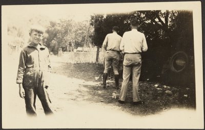 Men Outside with Junk by Louis Fleckenstein