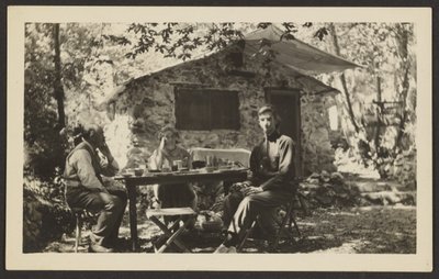 Outdoor Meal at Stone House in Woods by Louis Fleckenstein