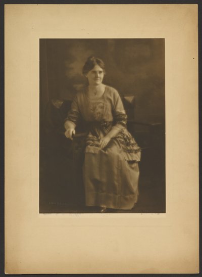 Portrait of a Seated Woman in Dress with Ribbon Accents by Louis Fleckenstein