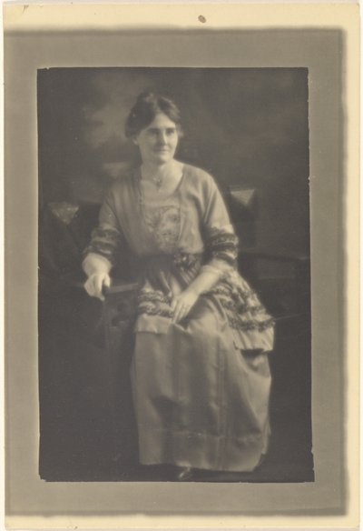 Portrait of a Seated Woman in Dress with Ribbon Accents by Louis Fleckenstein