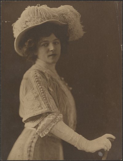 Portrait of a Woman Standing with Umbrella by Louis Fleckenstein