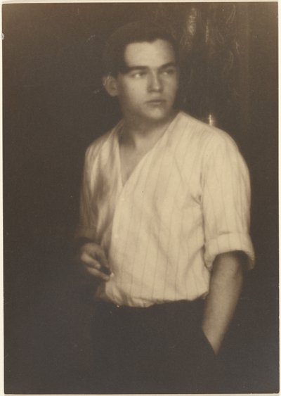 Portrait of a Young Man in Striped Shirt with Cigarette by Louis Fleckenstein
