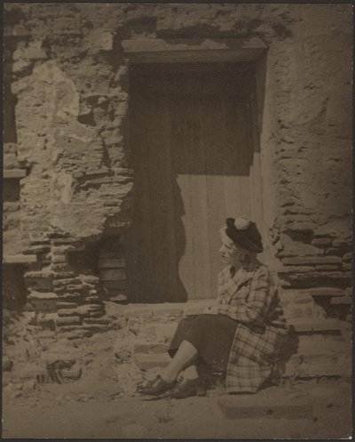 Woman Seated Before Deteriorating Building by Louis Fleckenstein