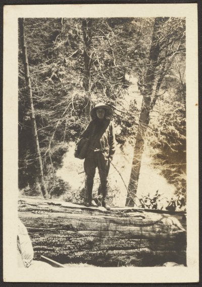 Woman Standing on Fallen Tree by Louis Fleckenstein