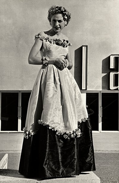 Model in ball gown created by the couture house Graldi by Luis Bogino