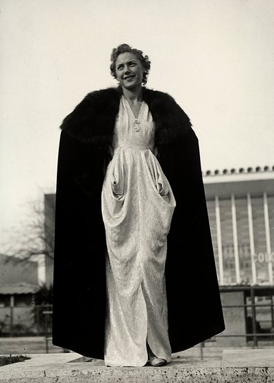 Model in evening dress, a creation of the couture house "Graldi" by Luis Bogino