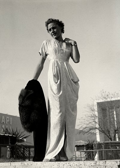 Model in evening dress created by the couture house 