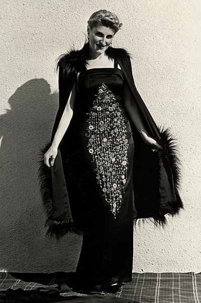 Model in evening dress created by the couture house "Graldi" by Luis Bogino