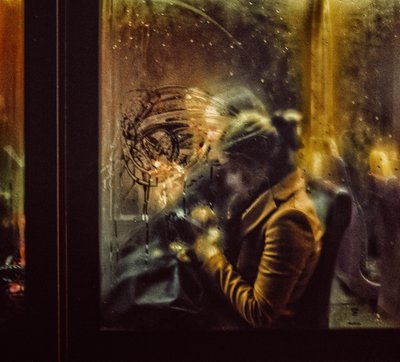 Woman At Rainy Window by Maciej Przeklasa