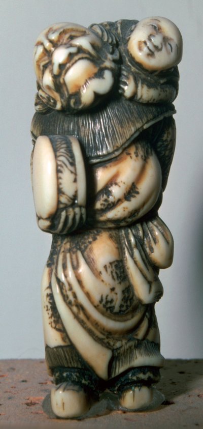 Japanese Netsuke of a Chinese dancer and child, 18th century by Masahira