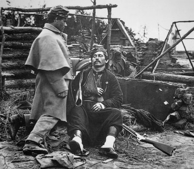 Wounded soldier from a Federal Zouave regiment, c.1865 by Mathew Brady