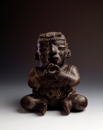 Anthropomorphic clay vase depicting a man seated with hands joined in the shape of a circle by Mayan Mayan
