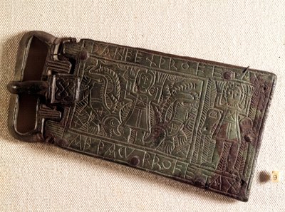 Bronze belt buckle of the Burgundian kingdom representing Daniel in the lion pit by Merovingian Merovingian