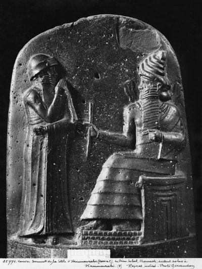 Code of Hammurabi, top of the stele, the god Shamash dictating his laws to Hammurabi, King of Babylon, found at Susa, c.1750 BC by Mesopotamian