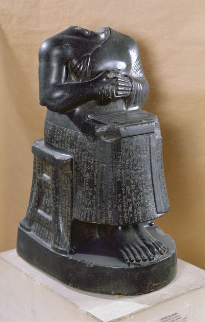 Headless statue of Prince Gudea as an architect by Mesopotamian