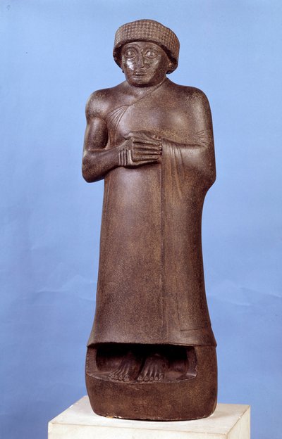 Mesopotamia: statue in diorite without inscription of Gudea, governor of the city of Lagash. About 2150 BC. Neo-Sumerian period. Paris, Louvre Museum by Mesopotamian Mesopotamian