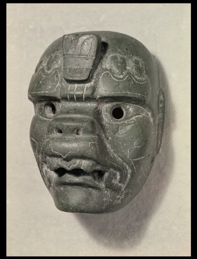 Feline mask of a man, from Oaxaca, Pre-Columbian by Mexican School