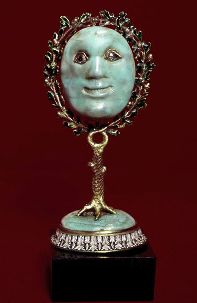 Mexican art: face mask in turquoise paste with diamond eyes. 17th century by Mexican School