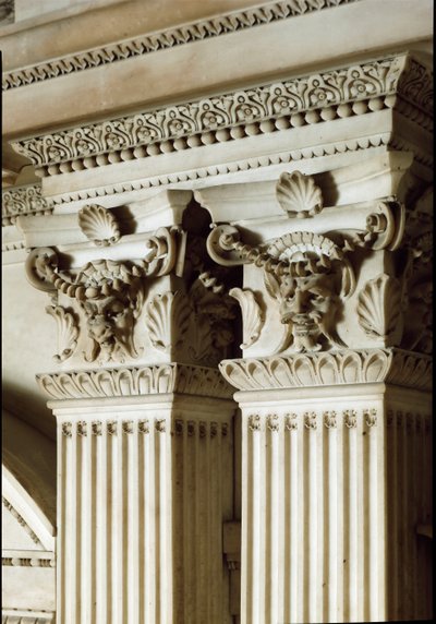 Allegory of Day and Night: Detail of the Columns and Capitals. Mausoleum of Giuliano de Medici. Marble Sculpture by Michelangelo Buonarroti