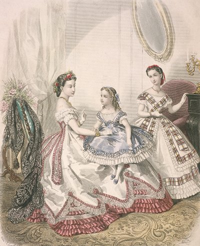 Two women and a small girl wearing the latest indoor fashions by Millia Lacouriere