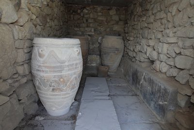Minoan archaeological site of Phaistos. The magazine of the giant pithoi (storage jars). These jars are decorated with disc and rope patterns in relief. by Minoan
