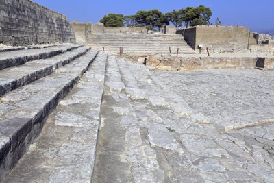 Minoan archaeological site of Phaistos. The west court and the theatral area. Large paved court in front of the facade and the central entrance of the palace (1900 -1700 BC). This court played an important part in the lives of the inhabitants. by Minoan