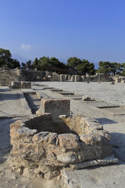Minoan archaeological site of Phaistos. General view of the central court from the shrines of the west wing. The central court is a basic architectural element of Minoan palace. It is a core around which the different wings are set. by Minoan