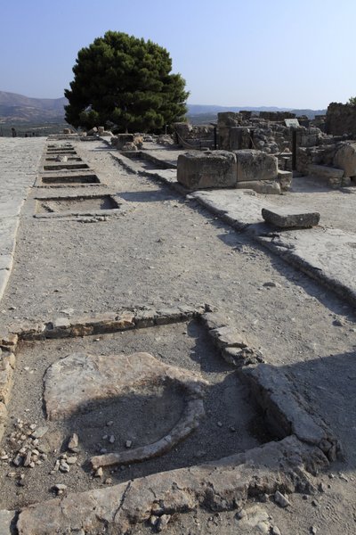 Minoan archaeological site of Phaistos. General view of the west wing shrines along the central court from the north wing by Minoan