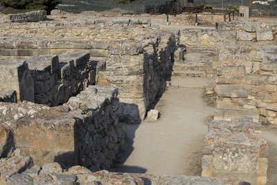 Minoan archaeological site of Phaistos. View over the North East Complex. Complex of four rooms directly adjoining the old palace. These rooms were used to store valuable ritual vessels. The famous Phaistos disc bearing hieroglyphic writing was found here. by Minoan