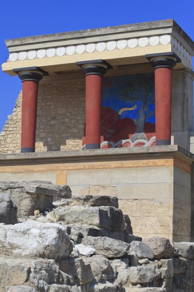 Minoan archaeological site of Knossos. North entrance, North pillar Hall. Bastion reconstructed by Arthur Evans where he put a copy of a restored relief fresco of a bull. Knossos, Crete. by Minoan