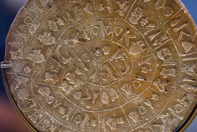 Phaistos disc. Symbolic signs arranged in a spiral (A side) by Minoan