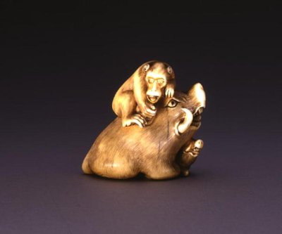 Netsuke, depicting a boar with a monkey by Mitsuhide