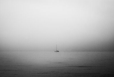 Lonely Sailboat In Fog by Monika Zemojtel
