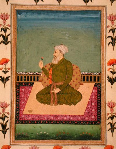 A ruler seated on a carpet or terrace, holding a flower, from the Small Clive Album by Mughal School