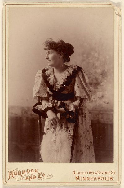 Unidentified Woman in Profile with Feather Fan by Murdock and Company