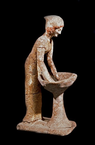 Mycenaean Art: Figurine of Woman Peaking Flour. 16th Century BC by Mycenaean