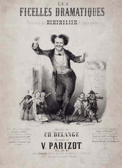 Portrait of Jean Berthelier holding the sons of puppets. Album 