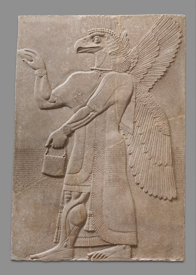 Relief panel of winged eagle-headed supernatural figure by Neo Assyrian