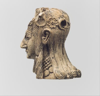 Head of a female figure by Neo Assyrian