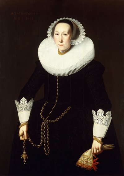 Portrait of a Lady, Standing Three Quarter Length, Wearing an Elaborate Black Costume, a White Ruff, and Lace Cuffs, Holding a Gold Chain and a Pair of Gloves by Nicolaes Eliasz