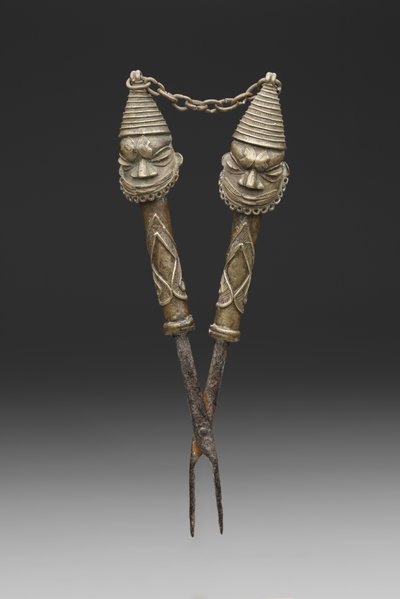 Figurated tongs for Oshugbo Society rituals by Nigerian Nigerian