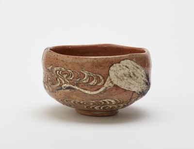 Kenzan style tea bowl with design of crane and flowing water, late 19th century by Ogata (style of) Kenzan
