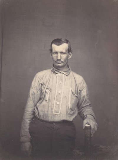 Man Holding Patent Office Book by Oliver H. Willard.