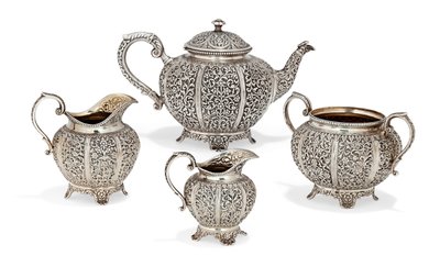 Repousse four-piece tea set, late 19th century by Oomersi Mawji