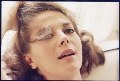 Natalie Wood at home with head on pillow by Orlando Suero